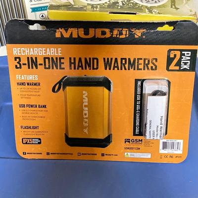LOT 63: New in Package and More - Muddy Hand Warmers, Pruning Saw, Manna Straws, Swivel Lens Head Lamp, Stretch Cords and Fire Starter
