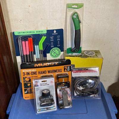LOT 63: New in Package and More - Muddy Hand Warmers, Pruning Saw, Manna Straws, Swivel Lens Head Lamp, Stretch Cords and Fire Starter