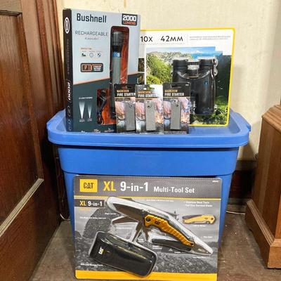 LOT 66: Bushnell Rechargeable Flashlight, CAT XL 9 in 1 Multi-Tool Set, National Geographic Binoculars and Three Magnesium Fire Starters...