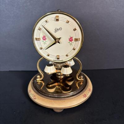 LOT 89: Collection of Schaltz Anniversary Clocks: 400-Day, Plastic Domes, Untested