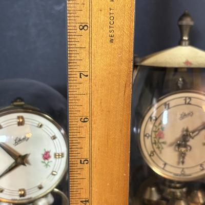 LOT 89: Collection of Schaltz Anniversary Clocks: 400-Day, Plastic Domes, Untested