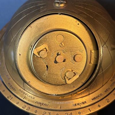 LOT 104: Vintage Imexal 18 Jewel 8-day World Clock, Florn Travel Alarm Clock, Bulova Swiss Made Alarm & Wooden Wall Barometer Made in...