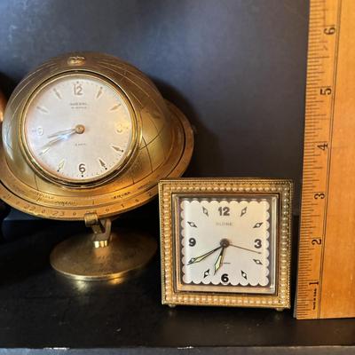 LOT 104: Vintage Imexal 18 Jewel 8-day World Clock, Florn Travel Alarm Clock, Bulova Swiss Made Alarm & Wooden Wall Barometer Made in...