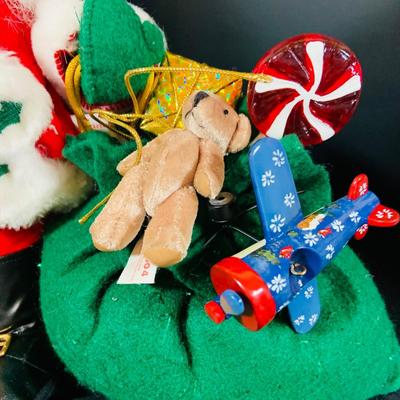 LOT 166: Annalee Holiday Dolls Santa Claus with a Bag Full of Toys and Mrs Claus