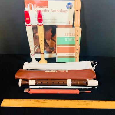 LOT 176: Vintage Wind Instruments Including Two (2) Flutophones, an Aulos Soprano Recorder, Sheffield Recorder, Slide Whistle and Books