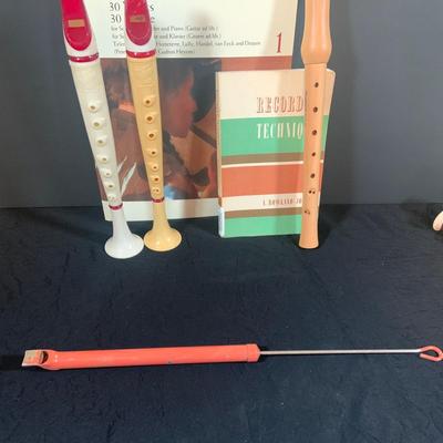 LOT 176: Vintage Wind Instruments Including Two (2) Flutophones, an Aulos Soprano Recorder, Sheffield Recorder, Slide Whistle and Books