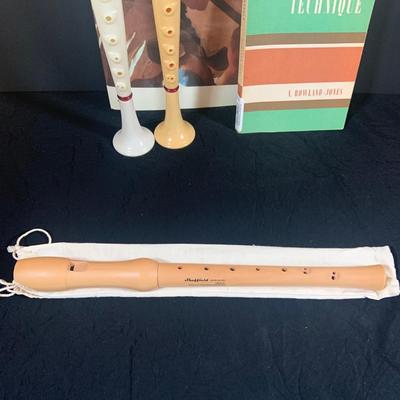 LOT 176: Vintage Wind Instruments Including Two (2) Flutophones, an Aulos Soprano Recorder, Sheffield Recorder, Slide Whistle and Books