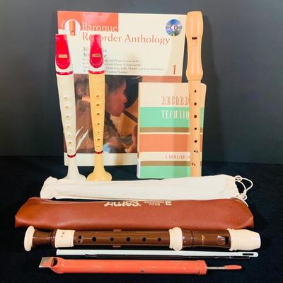 LOT 176: Vintage Wind Instruments Including Two (2) Flutophones, an Aulos Soprano Recorder, Sheffield Recorder, Slide Whistle and Books