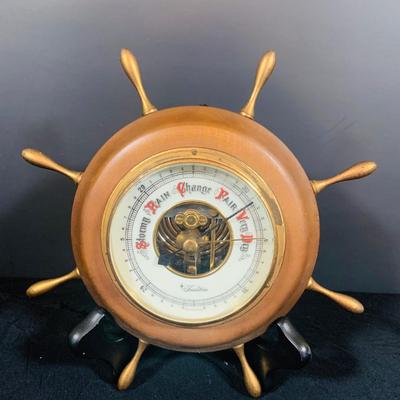LOT 177: Vintage Banjo Style Techron Nautical Themed Electric Wall Clock Ship’s Wheel Barometer and Vintage Selsi Forecaster Barometer