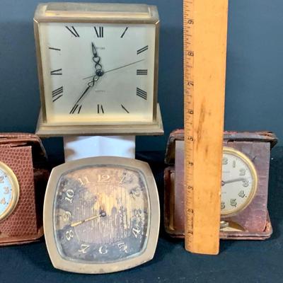 LOT 181: Collection of Vintage/Antique Travel Clocks and More Including Waltham and Doxa 8 Day, Travel Clocks, Concord Battery Operated...