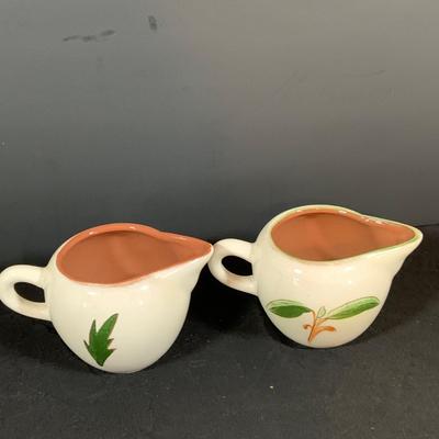 LOT 188: Collection of Stangl Pottery. Creamers and a Large Blue Ceramic Pitcher