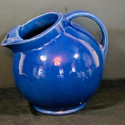 LOT 188: Collection of Stangl Pottery. Creamers and a Large Blue Ceramic Pitcher