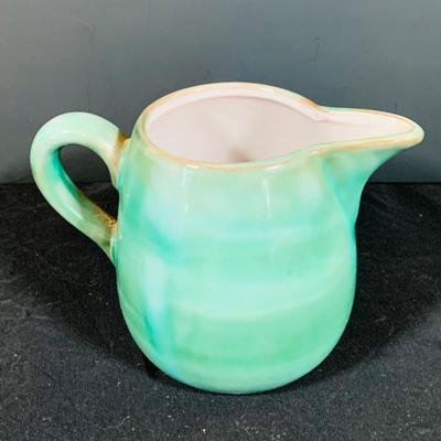 LOT 188: Collection of Stangl Pottery. Creamers and a Large Blue Ceramic Pitcher