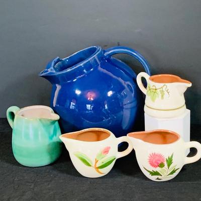LOT 188: Collection of Stangl Pottery. Creamers and a Large Blue Ceramic Pitcher