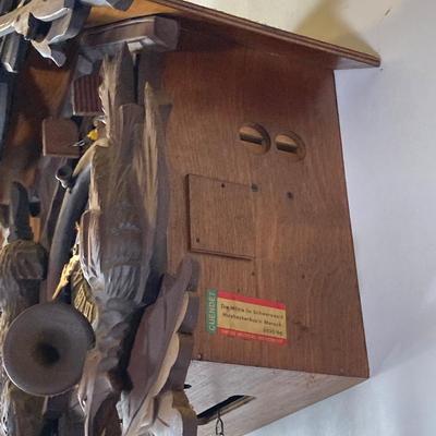 LOT 244: Cuendet Musical Movement Cuckoo Clock "Die Muhle Im Schwarzwald Holzhackerub'n Marsch 3695-96"