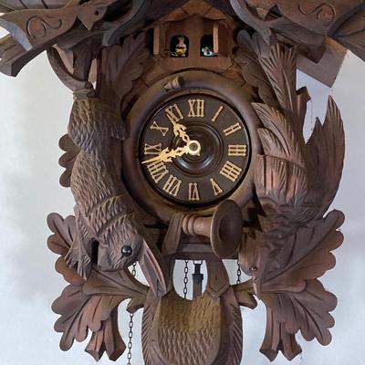 LOT 244: Cuendet Musical Movement Cuckoo Clock "Die Muhle Im Schwarzwald Holzhackerub'n Marsch 3695-96"