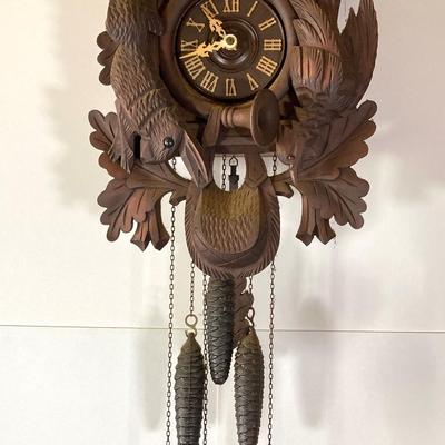 LOT 244: Cuendet Musical Movement Cuckoo Clock "Die Muhle Im Schwarzwald Holzhackerub'n Marsch 3695-96"