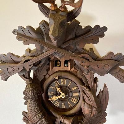 LOT 244: Cuendet Musical Movement Cuckoo Clock "Die Muhle Im Schwarzwald Holzhackerub'n Marsch 3695-96"
