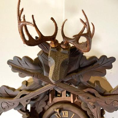 LOT 244: Cuendet Musical Movement Cuckoo Clock "Die Muhle Im Schwarzwald Holzhackerub'n Marsch 3695-96"