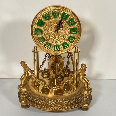 LOT 247: Vintage Kern Suhne Anniversary Figural Clock