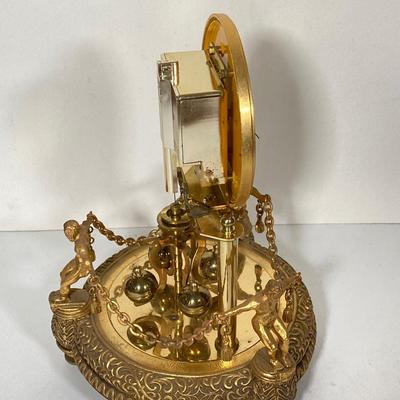 LOT 247: Vintage Kern Suhne Anniversary Figural Clock