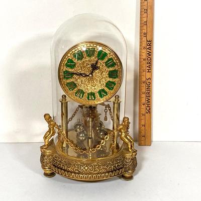 LOT 247: Vintage Kern Suhne Anniversary Figural Clock