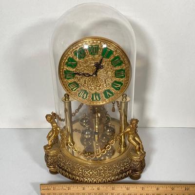 LOT 247: Vintage Kern Suhne Anniversary Figural Clock