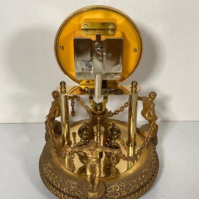 LOT 247: Vintage Kern Suhne Anniversary Figural Clock