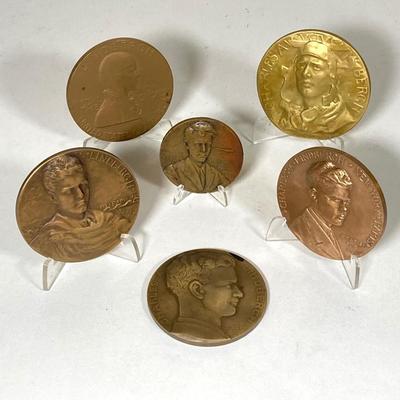 LOT 261: Collection of Six Charles Lindberg Commemorative Tokens / Medals