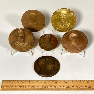 LOT 261: Collection of Six Charles Lindberg Commemorative Tokens / Medals