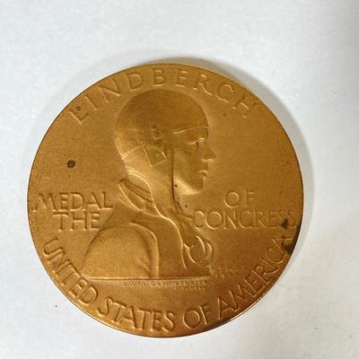 LOT 261: Collection of Six Charles Lindberg Commemorative Tokens / Medals