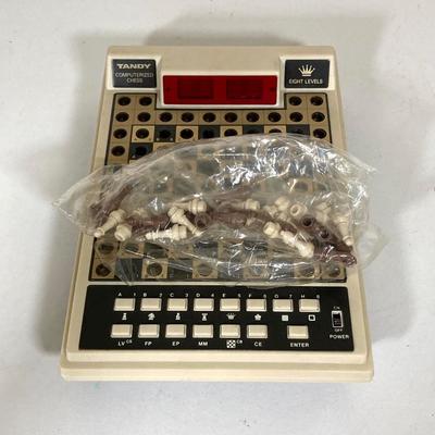 LOT 262: Chess Collection - Vintage, Miniature, Travel, Tandy Electronic and Books