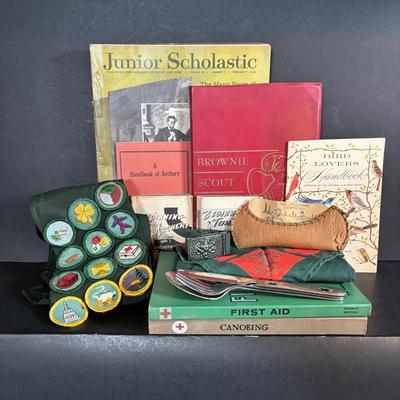 LOT 273: Vintage Scouting Sash w/Badges, Books, Scarf etc., Junior Scholastic Magazines & American Red Cross Canoeing & First-Aid...