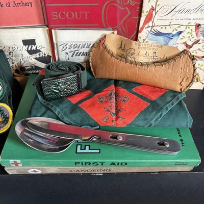 LOT 273: Vintage Scouting Sash w/Badges, Books, Scarf etc., Junior Scholastic Magazines & American Red Cross Canoeing & First-Aid...