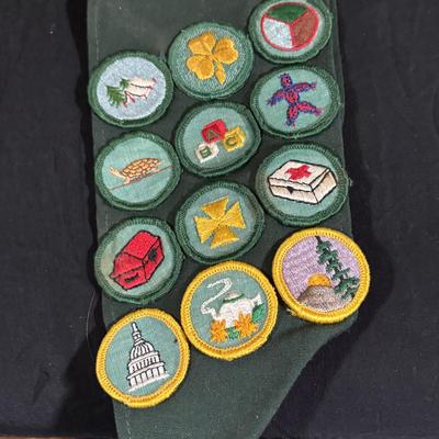 LOT 273: Vintage Scouting Sash w/Badges, Books, Scarf etc., Junior Scholastic Magazines & American Red Cross Canoeing & First-Aid...