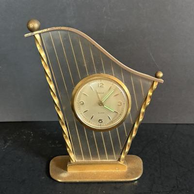 LOT 275: Vintage Linden Lucite Harp Alarm Clock, Luxor Desk Clock w/Scenic Dial, Brass Swiza 8-Day Travel Alarm Clock, & Kaiser Lamp...