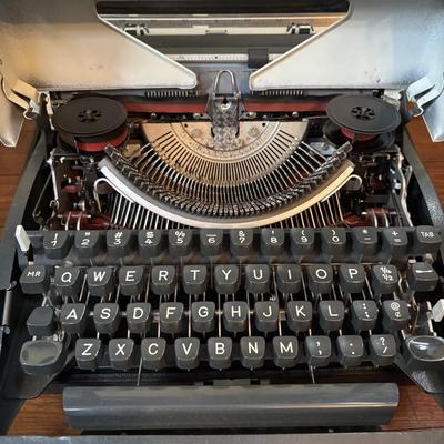 LOT 280: Olympia Typewriter, Made in W. Germany w/Carrying Case