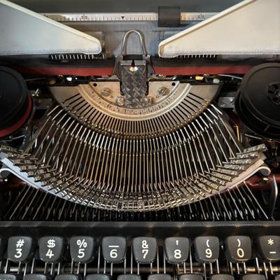 LOT 280: Olympia Typewriter, Made in W. Germany w/Carrying Case