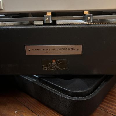 LOT 280: Olympia Typewriter, Made in W. Germany w/Carrying Case