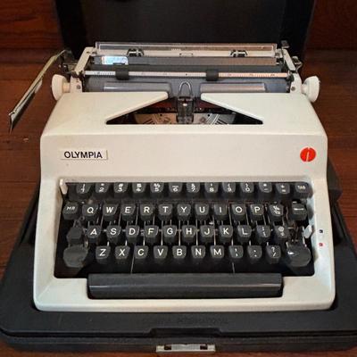 LOT 280: Olympia Typewriter, Made in W. Germany w/Carrying Case