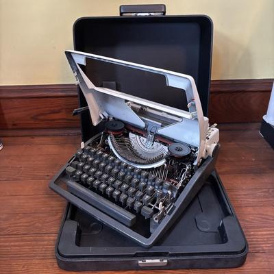 LOT 280: Olympia Typewriter, Made in W. Germany w/Carrying Case