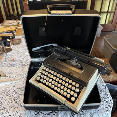 LOT 281: Brother Model XL1012 Typewriter w/Carrying Case