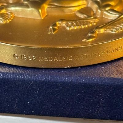LOT 286: Medallic Art Company 1982 Marcel Jovine Dreamer of Dreams Gold Plated Bronze Medal and 1981 Marcel Jovine Aviation History Maco...