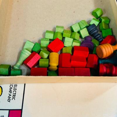 LOT 291: Black Steamer Trunk Loaded with Vintage Toys and Books Including Monopoly, Cribbage and More