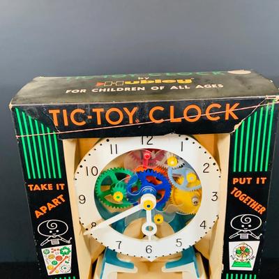 LOT 306: Hubley Toys Tic-Toy Clock Take Apart Clock Puzzle In Original Package and a Kay an EE Wood Weaving Loom In Original Box