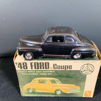 LOT 299: Testors/ Italeri 1934 Rolls-Royce Phantom II Model and Monogram Duesenberg SJ Roadster In Unopened Boxes and a 48 Ford Coup Die...