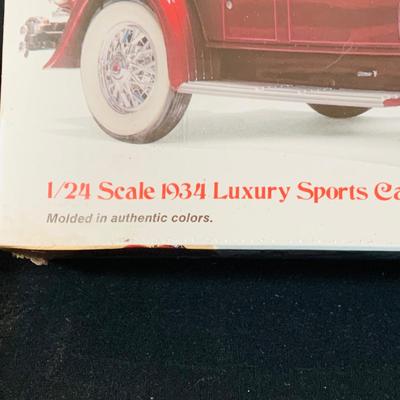 LOT 299: Testors/ Italeri 1934 Rolls-Royce Phantom II Model and Monogram Duesenberg SJ Roadster In Unopened Boxes and a 48 Ford Coup Die...