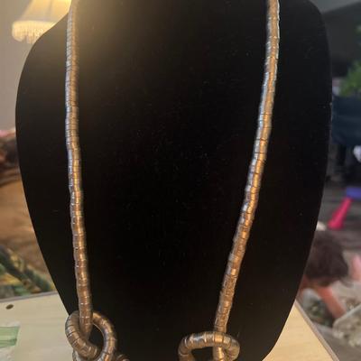 Thick gold tone chain with knots