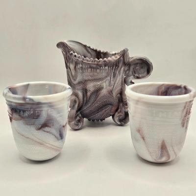 LOT 26L: Two Just a Thimble Full Purple Slag Shot/Jigger Glasses, and Small Pitcher/Creamer