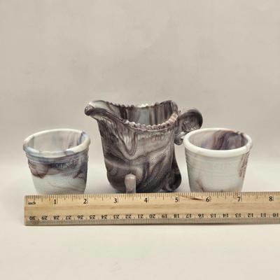 LOT 26L: Two Just a Thimble Full Purple Slag Shot/Jigger Glasses, and Small Pitcher/Creamer